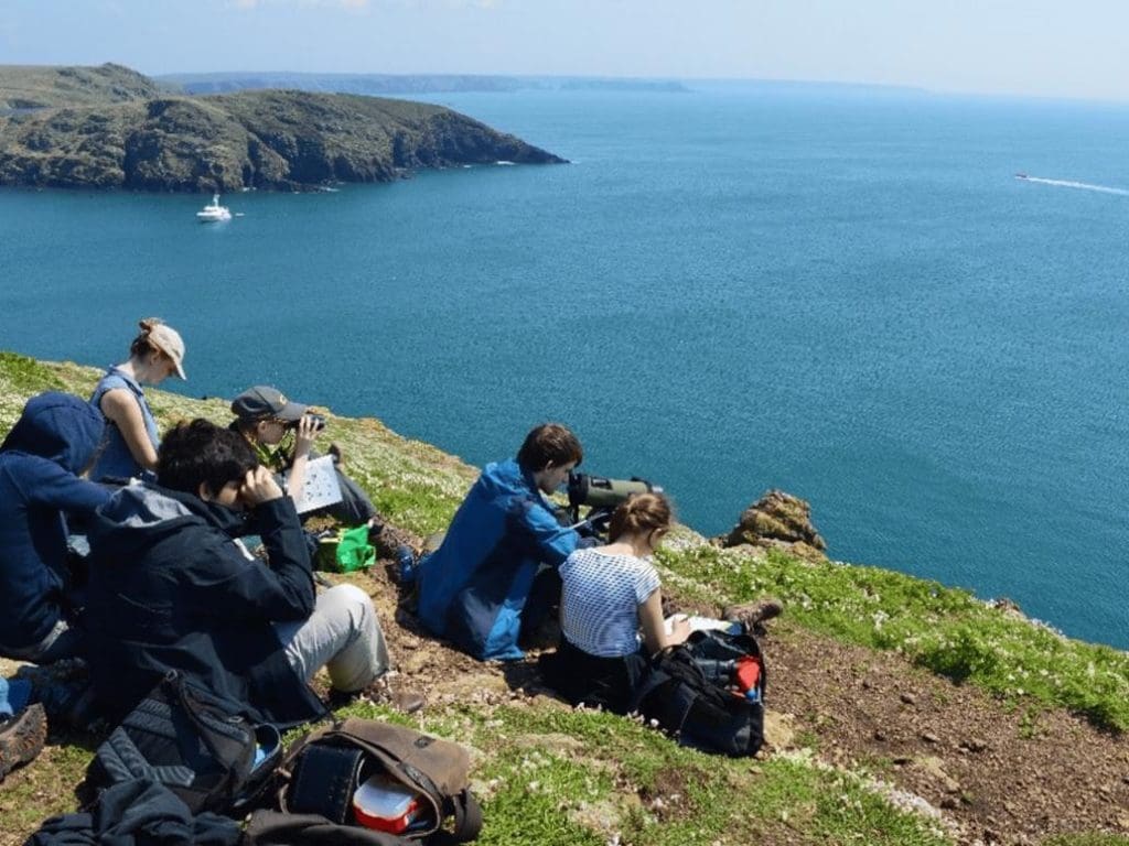 students at the seaside