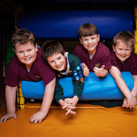 school group in an indoor play park