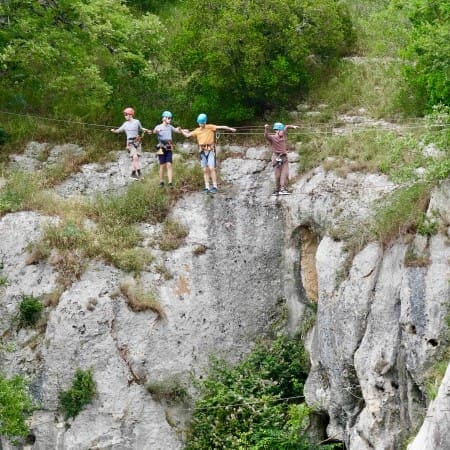students on an outside high ropes course in La Savane France
