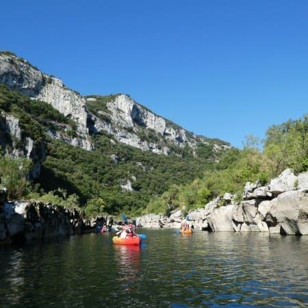 students on a lake in boats in France La Savane