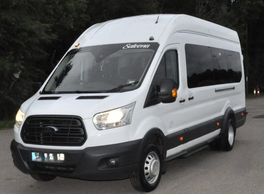 mini bus coach in a cark park for continental coaches promotion