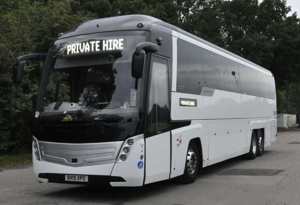 coach with sign saying private hire for school trip transport hire