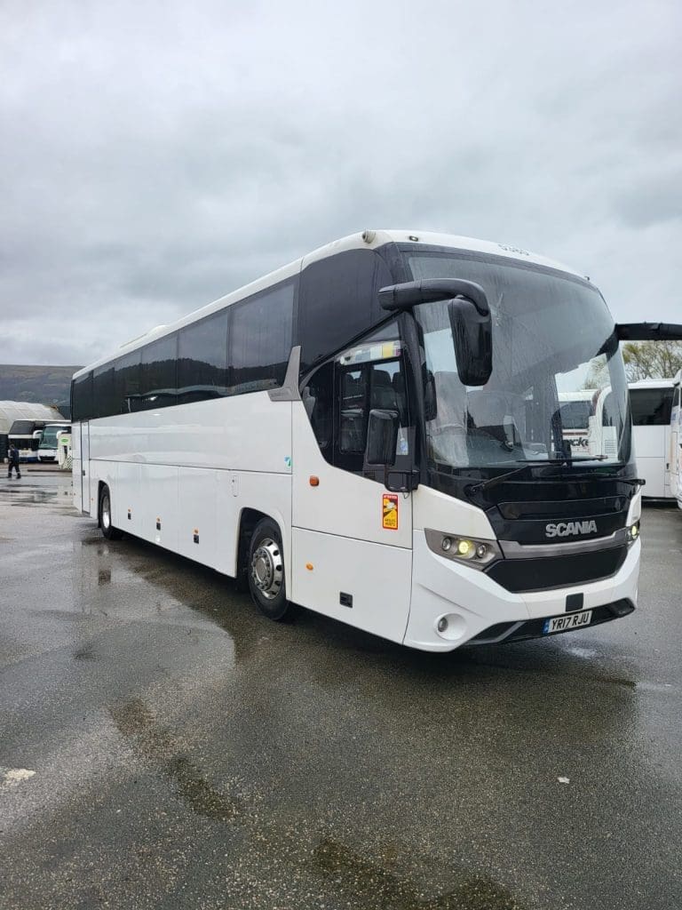 coach in a cark park for continental coaches