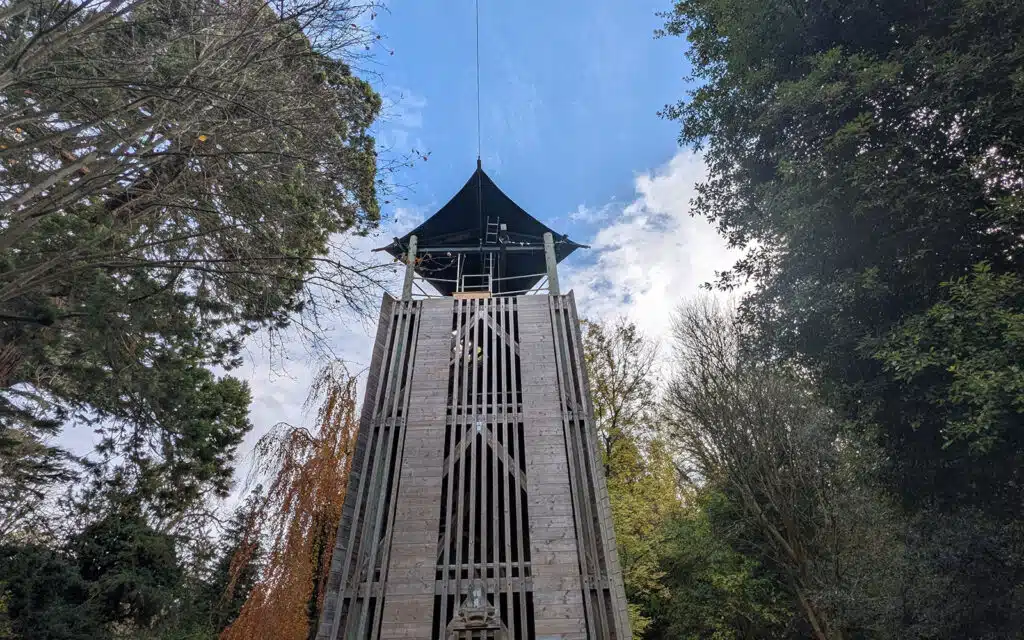 wooden high ropes towers located in a forest used by school groups for adventure activity