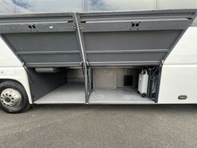 under storage area on a coach