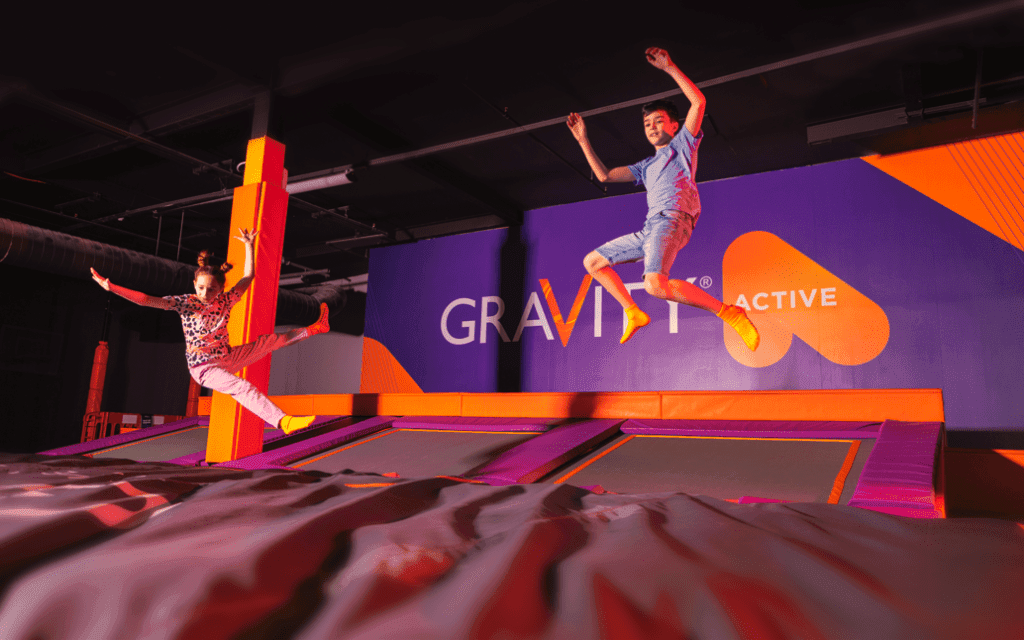 students on indoor trampolines