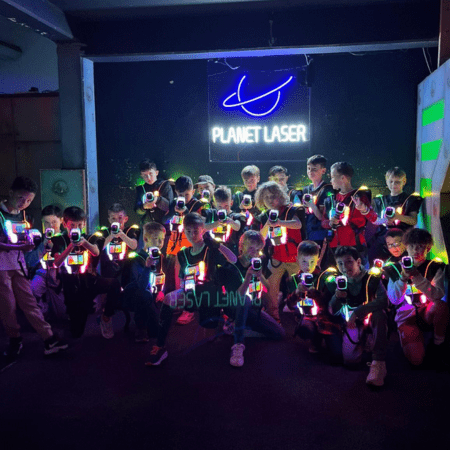 school group taking part in laser tag